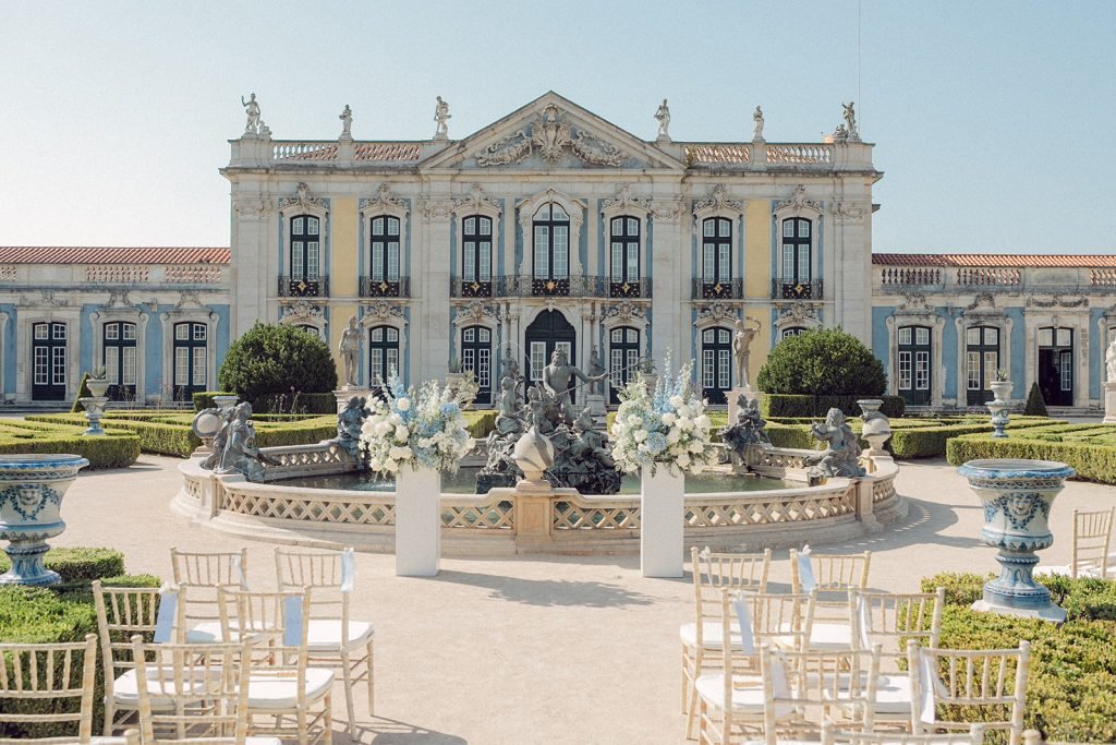 Wedding ceremony setup at Queluz Palace gardens in Portugal
