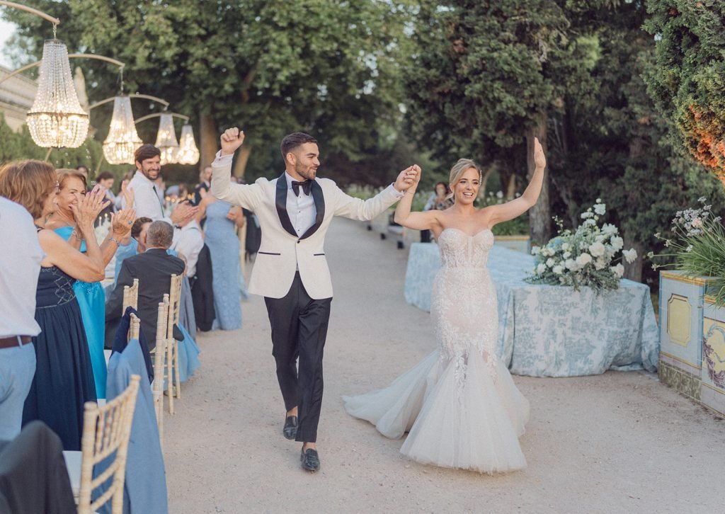 Couple entering reception at Lisbon wedding venue