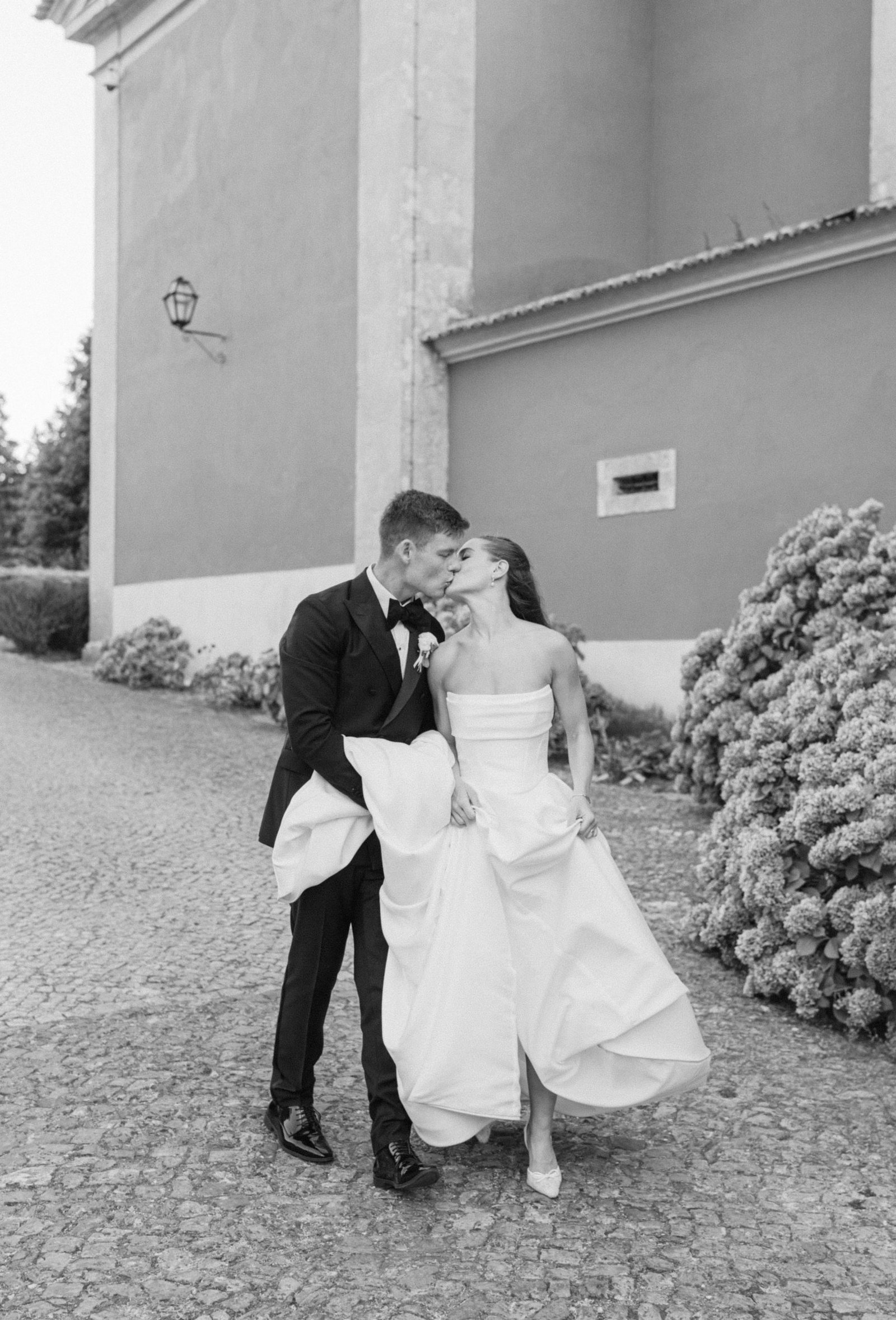 Bride and groom sharing their first kiss after their wedding ceremony in Florence, Italy — destination wedding photographer Flavia Grandi