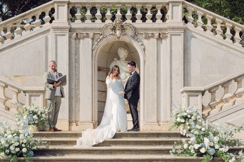 Bride and groom during vows at Lisbon garden wedding