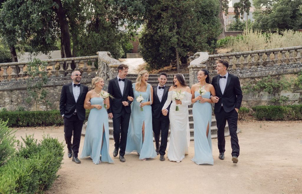 Bridal party walking together at Vandelli Botanical Garden wedding