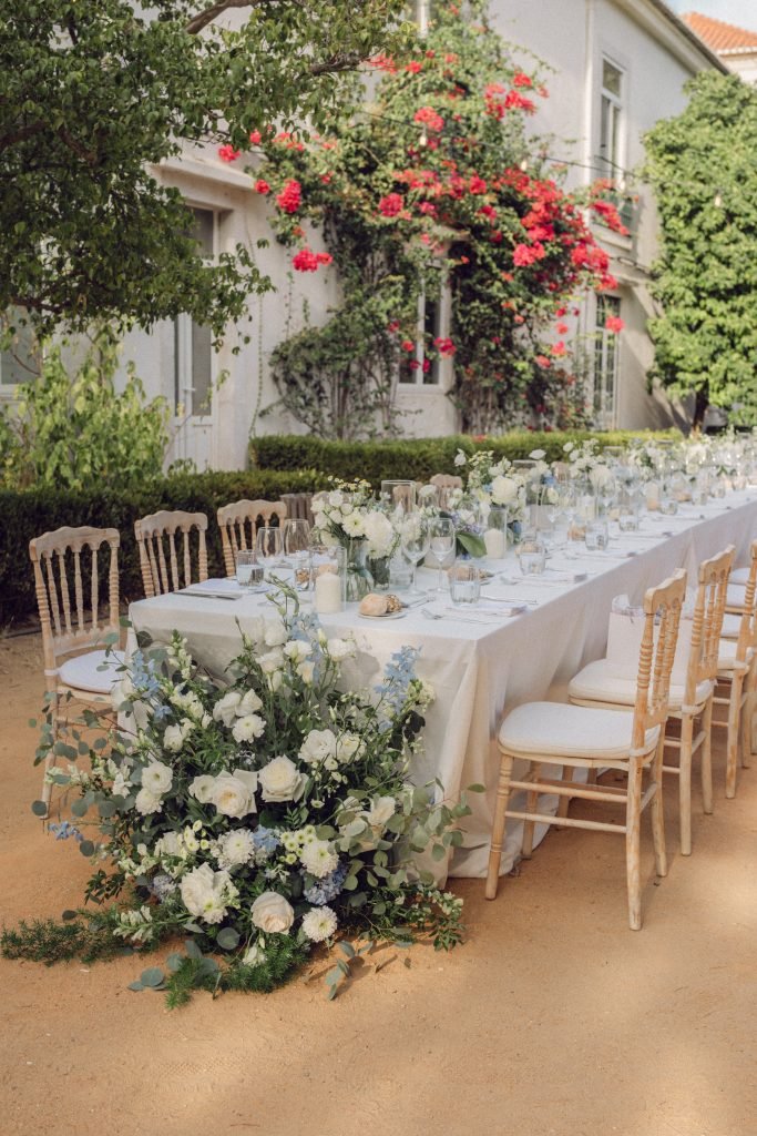 Elegant wedding table styling with florals and candles at Vandelli Botanical Garden Lisbon reception